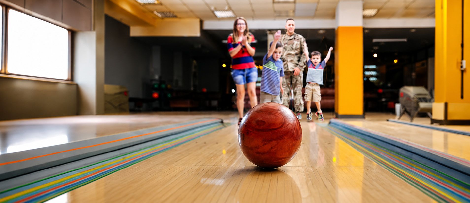Bowling ball rolling down a lane at Houston Bowling Center
